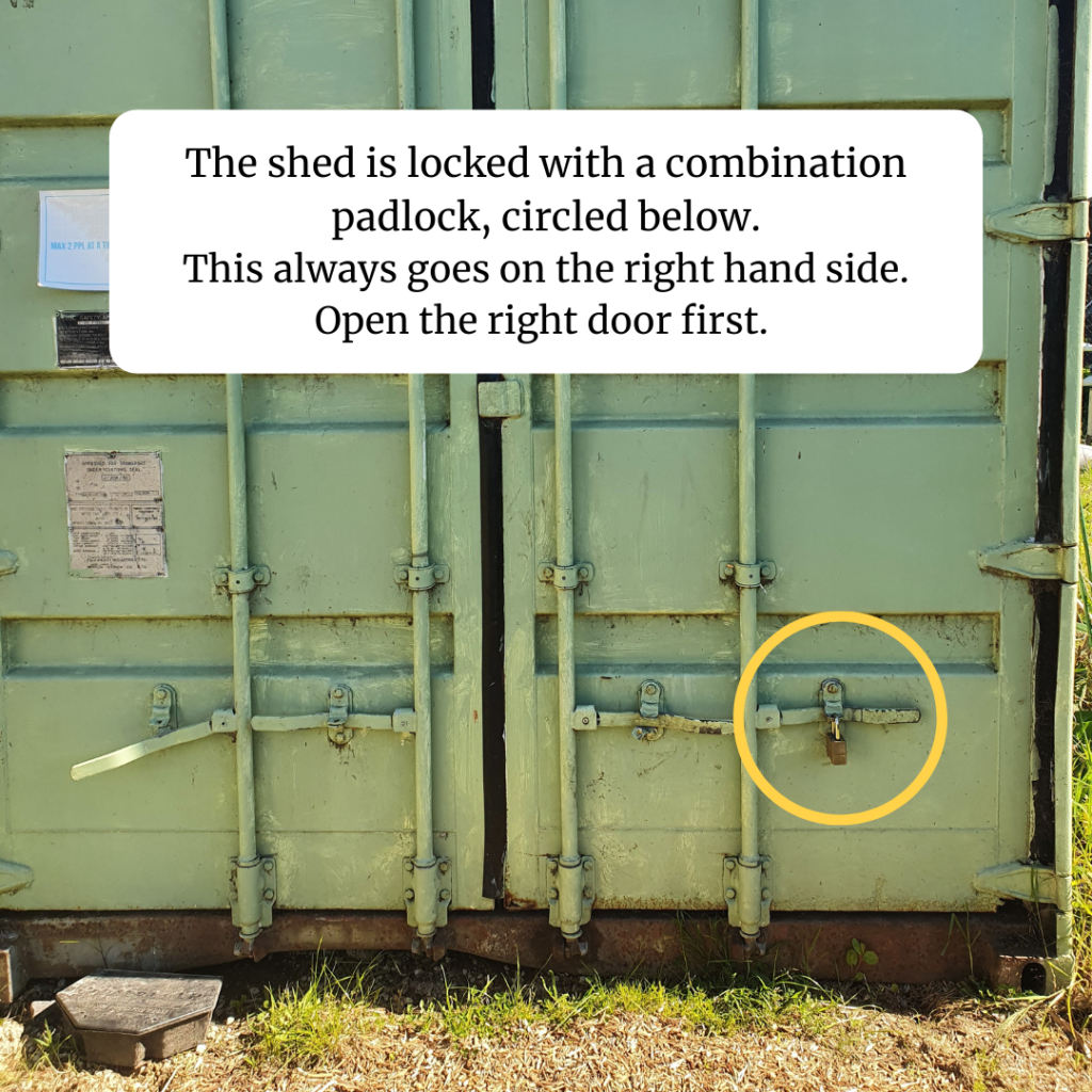 Image of the PCG shipping container shed with padlock on bottom right hand side.
